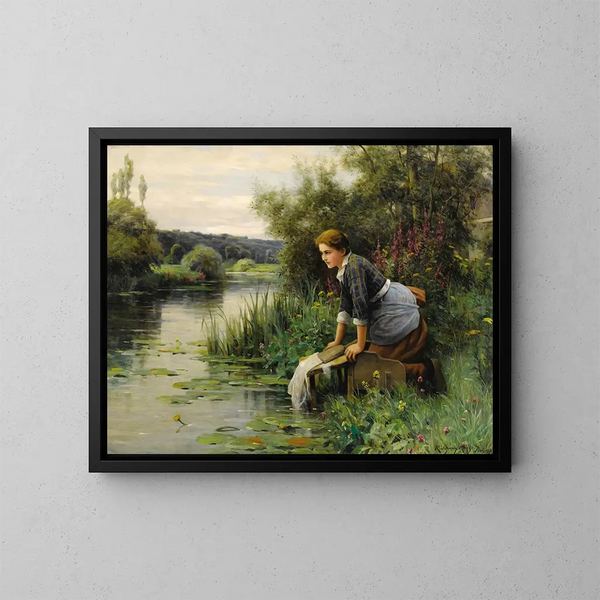 Laveuse au bord de l'eau - Daniel Ridgway Knight — kehystetty taideteos seinällä