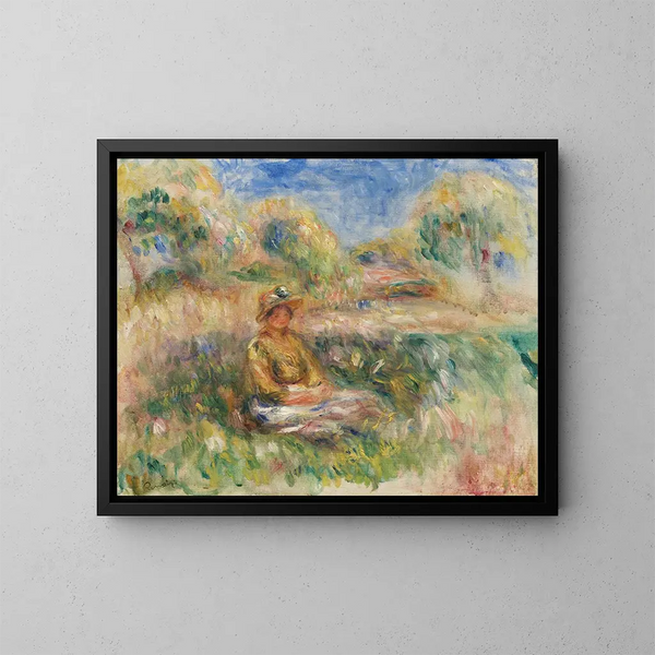 Nainen istuu maisemassa - Pierre-Auguste Renoir — kehystetty taideteos seinällä