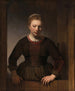 Nuori nainen puoliksi auki olevan oven edessä - Rembrandt van Rijn — näkymä teoksesta