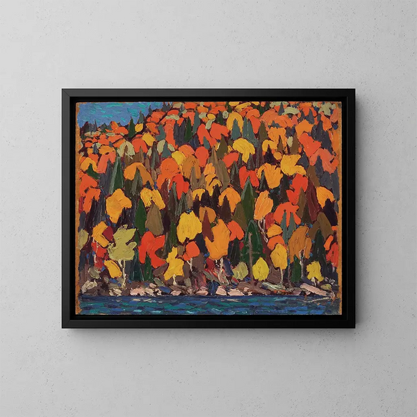 Syksyn lehtipuu - Tom Thomson — kehystetty taideteos seinällä