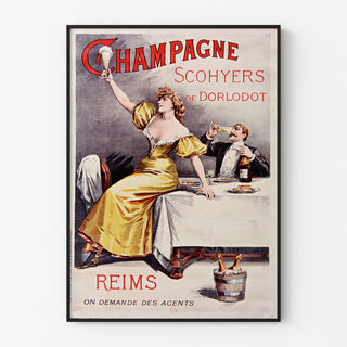 Vintagemainos Champagne Scohyers de Dorlodot, kapea kehystys vaalealla seinällä.