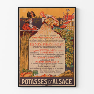 Vintageseinäjuliste Potasses d’Alsace -mainosjuliste, esitetty ohuessa kehyksessä vaalealla seinällä.