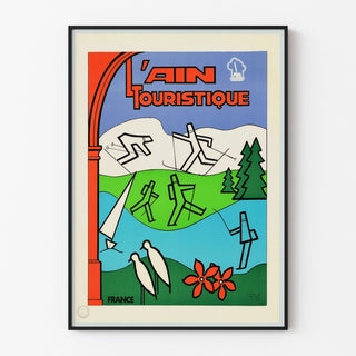 Vintagematkailujuliste – L’Ain touristique, ohutkehystettynä vaalealla seinällä.