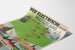 Vintage-matkailujuliste – Waterland, raitiovaunu, kaartuvalla paperilla perspektiivistä nähtynä.