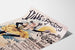 Vintageseinäjuliste Angers, mi‑carême, esitetty kaartuvalla paperilla perspektiivissä.