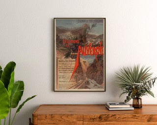 Vintage-juliste Auvergne, retket Orléans, kehystettynä puukomodin yläpuolelle kasvien väliin.