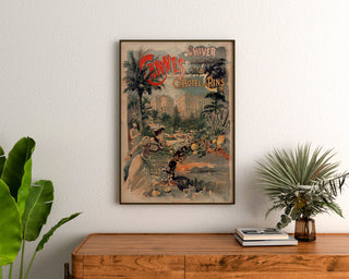 Vintage-juliste Cannes, Grand Hôtel des Pins, kehystetty puulaatikon yläpuolelle, kasvien välissä.