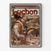 Vintage-juliste Luchon, Pyreneiden kuningatar, esillä ohuessa kehyksessä vaalealla seinällä.