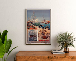 Vintage-juliste Port marchand. Marseille, kehystetty puulaatikon yläpuolelle, kasvien välissä.
