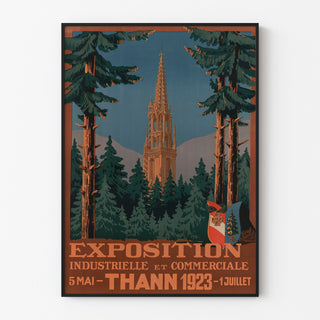 Vintageseinäjuliste Thann, teollisuusnäyttely, esitetty ohuessa kehyksessä vaalealla seinällä.