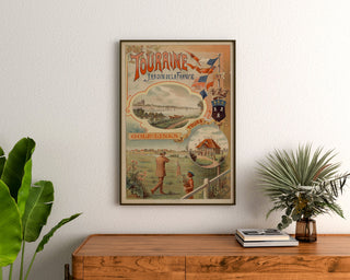 Vintage-juliste Touraine, Ranskan puutarha, kehystetty puupöydän yläpuolelle, viherkasvien välissä.